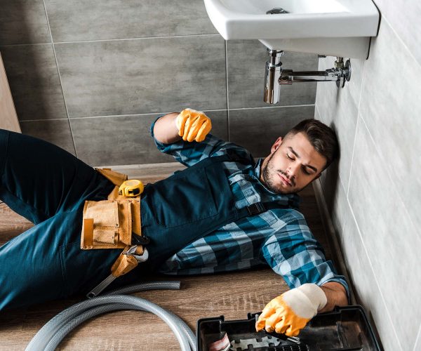bearded-handyman-lying-on-floor-near-toolbox-in-ba-resize.jpg ouujn