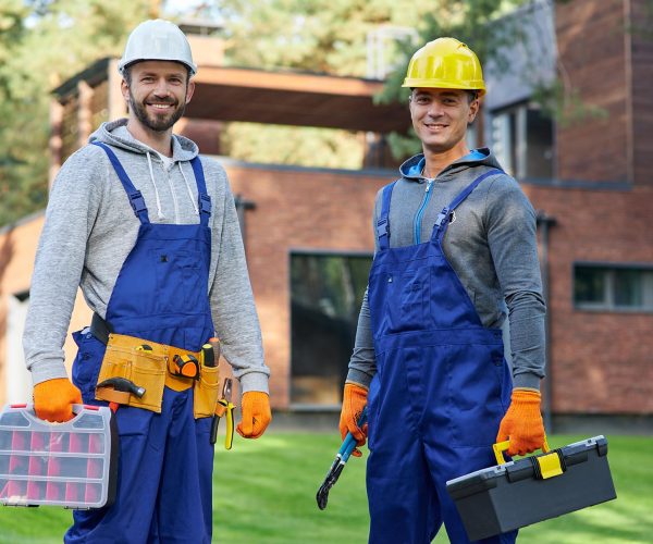 two-positive-handsome-young-male-engineers-in-hard-resize.jpg nnc